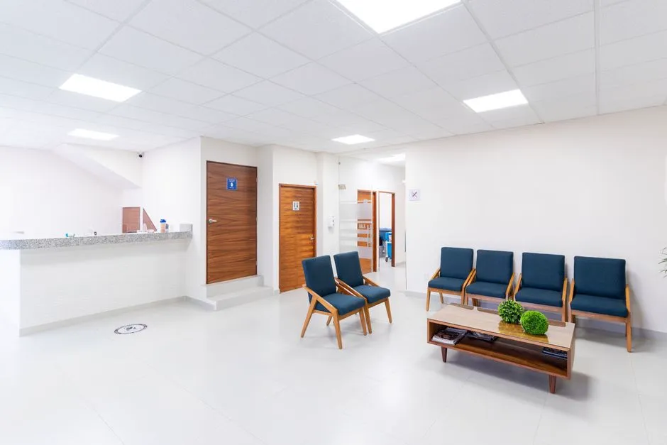 Bright, modern clinic waiting room with seating and natural light